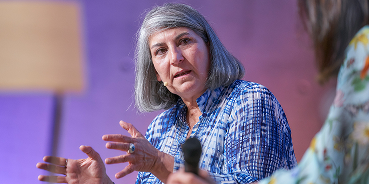 A woman at a panel discussion.